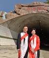 Mrs Lam (right) and the Deputy Secretary General of the Sichuan Provincial People's Government, Mr Zhao Weiping (left), at the tunnel entrance in Yingxiu County.