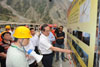 The Chief Secretary for Administration, Mr Henry Tang, inspects a major HKSAR-funded infrastructural project, the Provincial Road 303 (Yingxiu to Wolong section), in the Wenchuan County. The 45km-long road starts in Yingxiu, Aba Prefecture. It passes through Gengda Town and ends in Wolong Town. The road is a life-line for the Wolong natural reserve.