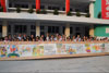 LegCo Members take a group photo with the students in Nanchong Shi Fu Jiang Lu Primary School.