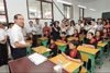 Photo shows the Chief Secretary for Administration, Mr Henry Tang, visiting a group of students at the Shuimo Middle School in Wenchuan.