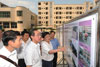 The Chief Secretary for Administration, Mr Henry Tang, was briefed on the construction progress of Baita Secondary School in Gaoping District.