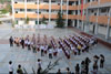 Nanchong Baita Junior Middle School students invite LegCo Members to sing a song 'A Grateful Heart' together with them.