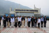 LegCo Members observe one-minute silent to mourn those who died in the earthquake in Yingxiu Xuankou Middle School.