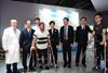 The Chief Executive, Mrs Carrie Lam, visited the University of Electronic Science and Technology of China (UESTC) in Chengdu this morning (May 12). Photo shows Mrs Lam (fourth right); the Chief Secretary for Administration, Mr Matthew Cheung Kin-chung (second left); the Secretary for Constitutional and Mainland Affairs, Mr Patrick Nip (second right); and the Party Secretary of UESTC, Mr Wang Yafei (third right), pictured with representatives of UESTC and the persons with disabilities using the assistive device.